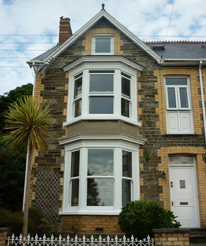 Bay sash windows on a Victorian house