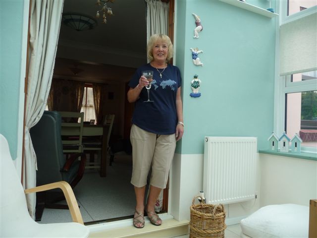 Homeowner at the finished conservatory