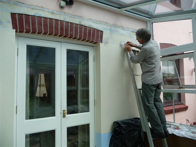 Installer fitting French doors