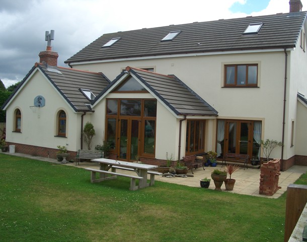 Home with cherrywood windows and doors