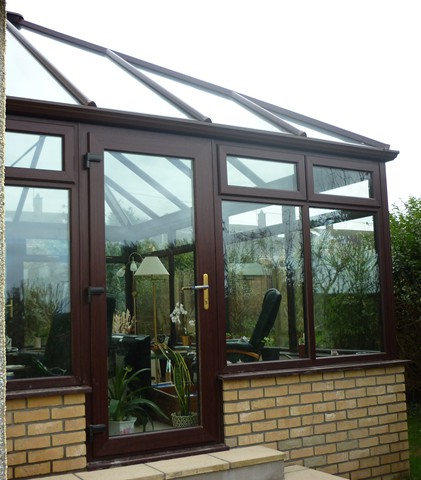 Conservatory with brick base and glass roof