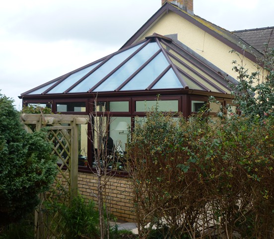 Glass roof conservatory in woodgrain finish