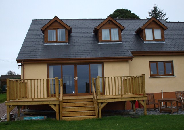 Golden oak windows on a new build home