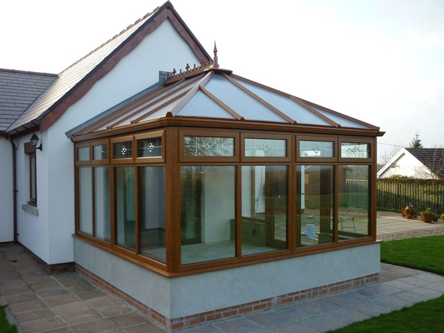 Light oak conservatory with polycarbonate roof
