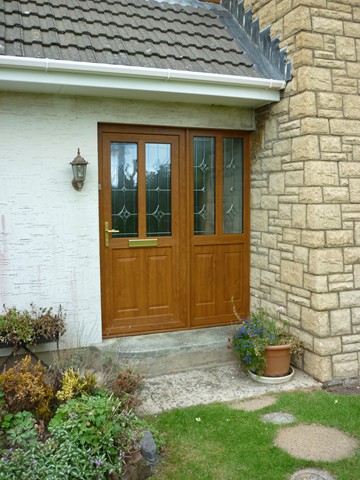 Light oak PVCu door with bevelled glass