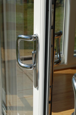Patio door handle and locking detail